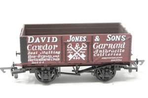 937385 MAINLINE 7 plank open used wagon 'David Jones' red-brown - BOXED