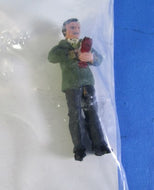 BP215 Standing Man Holding early Wireless phone - painted 0 Gauge