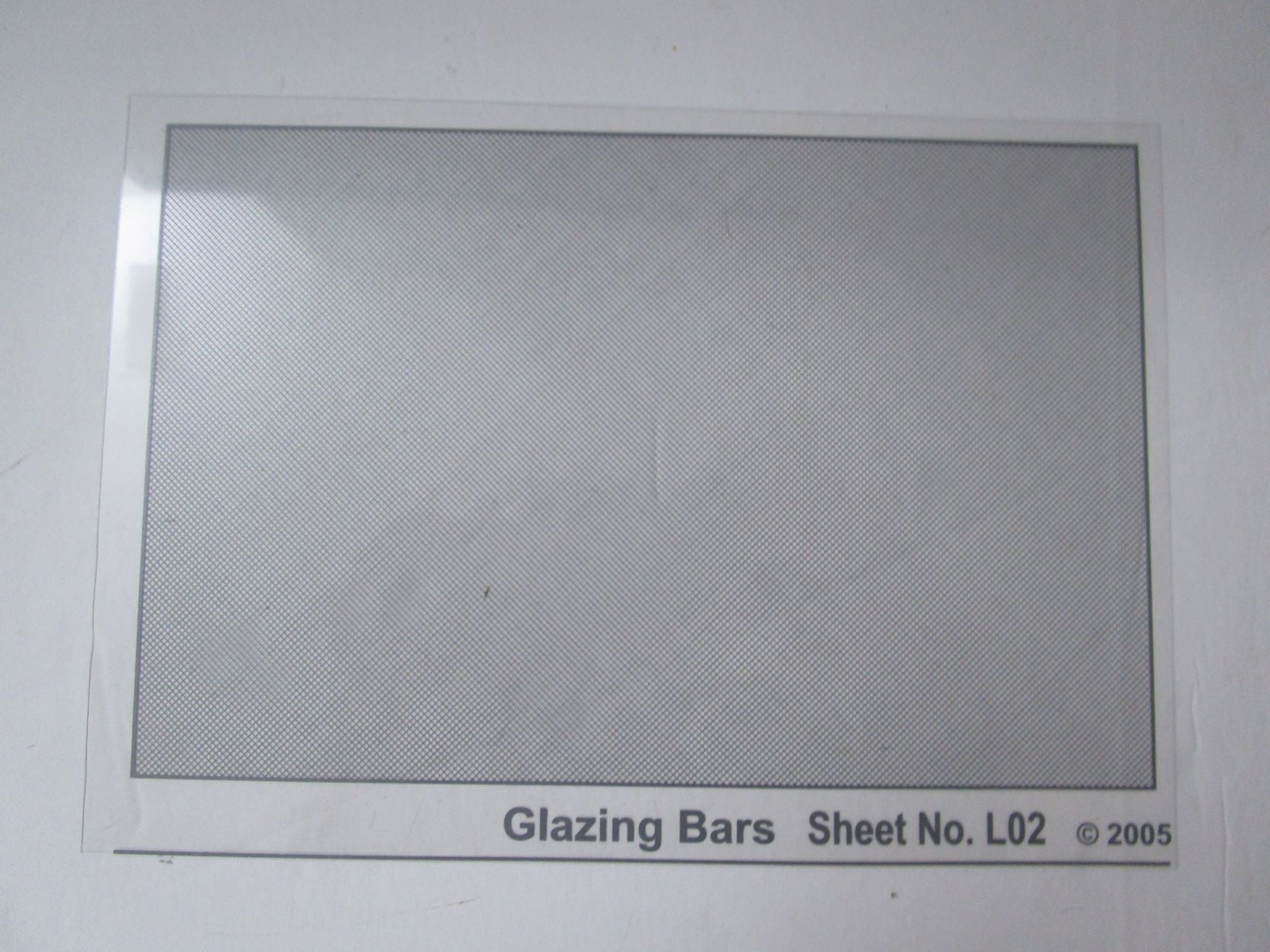 RAT-L02 RATIO grey Glazing Bars on clear acetate (00 gauge)
